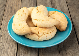 Chipas, typical south american cheese bun over wooden table