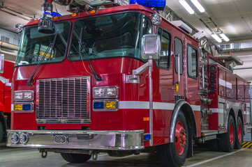 Fire station. A fire truck for delivering firefighters to the fire site and supplying fire...