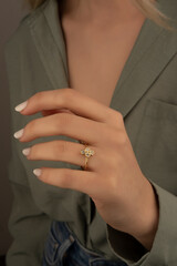 Heart diamond ring, look of a girl wearing beautiful jewelery with precious stones.