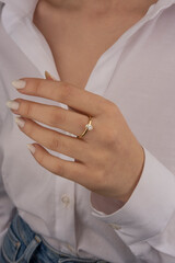 Obraz na płótnie Canvas Heart diamond ring, look of a girl wearing beautiful jewelery with precious stones.