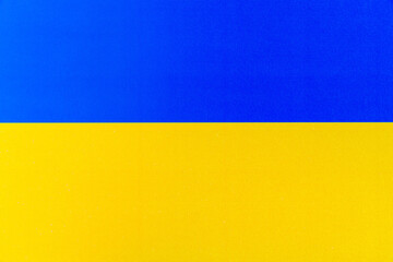 Paper flags of ukraine. Blue and yellow conceptual idea - with Ukraine in his heart. Support for the country during the occupation. Background for protest against war, military conflict