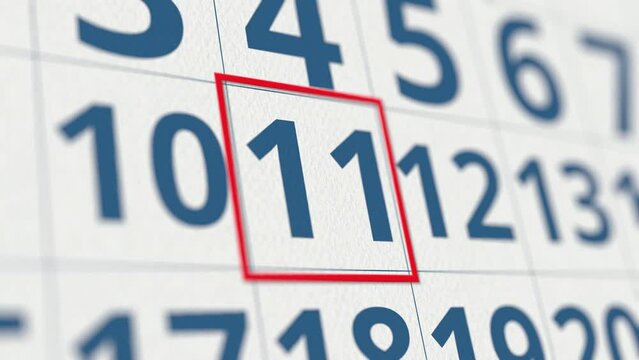 Calendar with marked 11 day of the month close-up