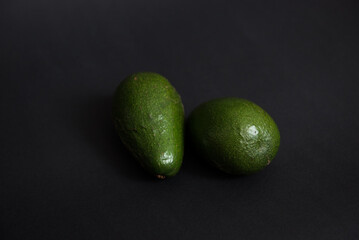 Avocado on black background
