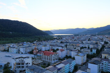 Fototapeta premium Aerial view of green city, Piatra Neamt, Kreuzburg in Romania