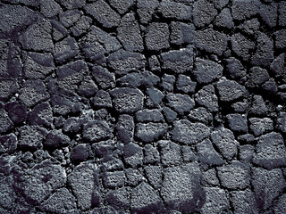closeup broken old asphalt driveway road highway zoomed industrial background