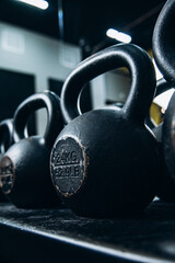 Naklejka na ściany i meble close up of a kettlebell gym sport equipment metal health fitness