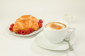 Fresh coffee in white cup, breakfast concept