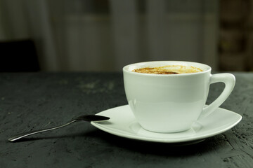 Fresh coffee in white cup, breakfast concept