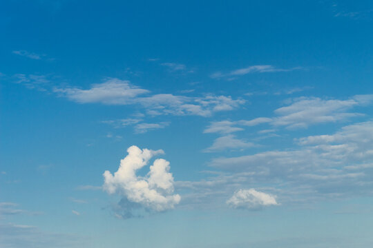 Beautiful white clouds against the blue sky © Jan Kravtsov