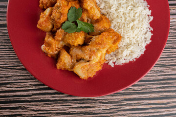 Meal - Chicken breast with pieces of mozzarella cheese and white rice