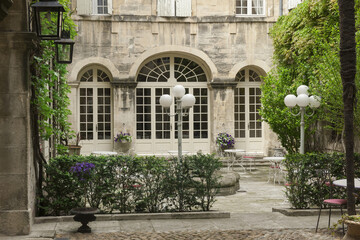 Fototapeta na wymiar Shadowed courtyard, Arles, France, Bouches du Rhône, Provence, France