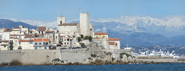 View over Antibes old town and snow-covered Alpes, Alpes-Maritimes Department, Cote d’Azur, France