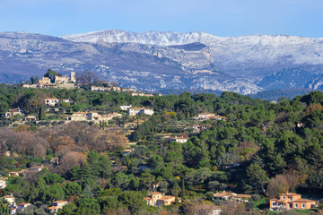 Fototapeta na wymiar View over the old village of Mougins and the snow-covered Alpes, Mougins, Alpes-Maritimes Department, Cote d’Azur, France