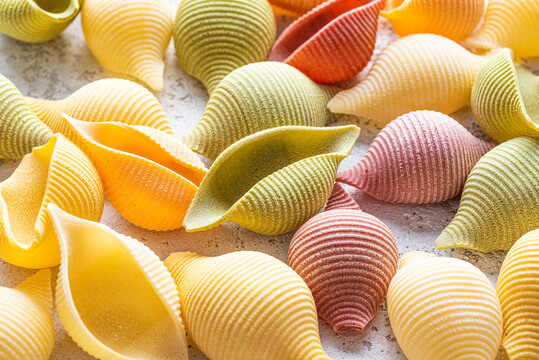 Close up view of colorful shell pasta. Organic, hand made pasta shell. 