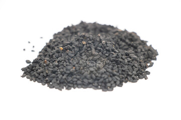 Nigella sativa seeds close up view. selective focus, Black cumin over white background