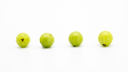 selective focus, gooseberry in a row isolated on white background, Amalaki