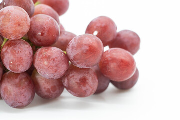Red grape isolated on white background.