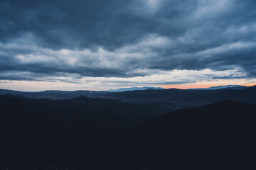 Red sunset in dark mountains of Corbieres, Aude, France