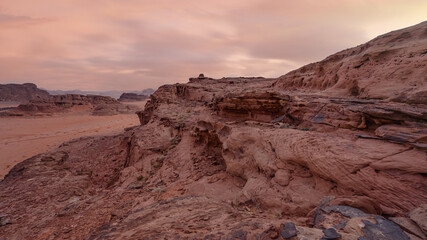 Rocky scenery in Wadi Rum desert during overcast morning