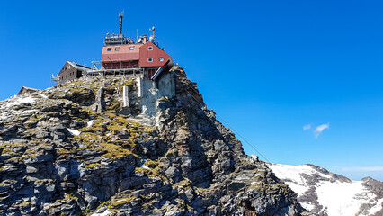 Fototapeta premium Panoramic view on the Zittelhaus Sonnblick Observatory on the summit of Hoher Sonnblick in the High Tauern Alps in Carinthia, Salzburg, Austria, Europe. Goldberg group in the Hohe Tauern National Park