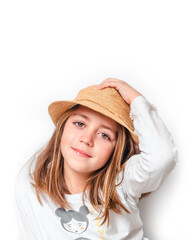 Closeup portrait of Caucasian girl smiling with hat.