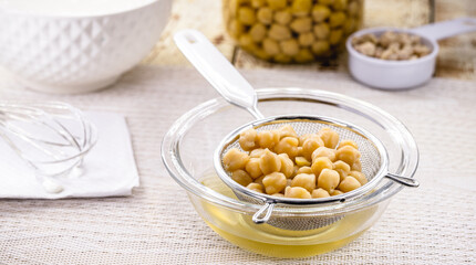 Aquafaba is the liquid for cooking chickpeas. Vegan or vegetarian ingredient used as a homemade alternative to egg whites in many recipes