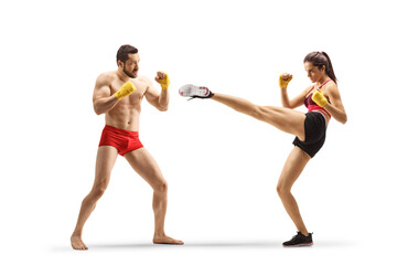 Fototapeta Male and female athlets exercising kick boxing obraz