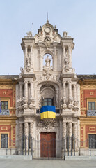 Flag in support of Ukraine on the façade of the Palacio de San Telmo. Main entrance to the headquarters of the Presidency of the Andalusian Regional Government. 