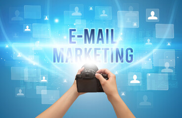 Close-up of hand holding camera