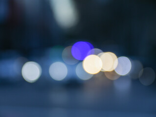 Lens-defocused lights creating rounded shapes or boké