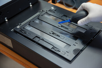 Cleaning the scanner and photographic films from dust. Converting an image to digital form.