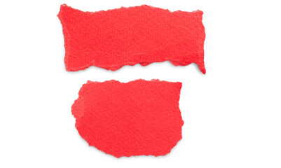on a white background two pieces of red paper