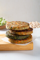 Stack of vegan nut and vegetables pancakes food