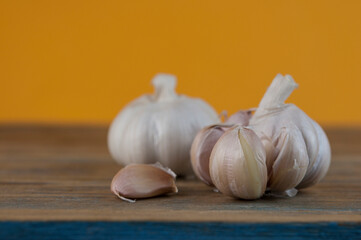 garlic wooden background is an old rustic retro vintage organic produc