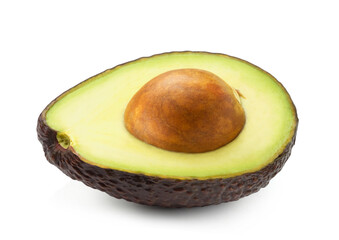 One half of ripe dark avocado isolated on white background.