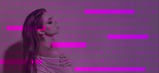 A woman in virtual reality on a pink neon background with an inscription from the codes. Future technology concept. Colorful neon lights.