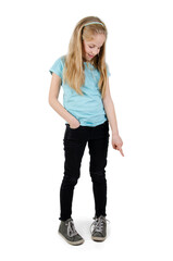 Full length of adorable pretty smiling girl pointing down, Isolated on white background