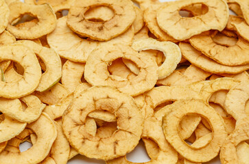 Apple chips. Background of dried fruits. Healthy and tasty food.