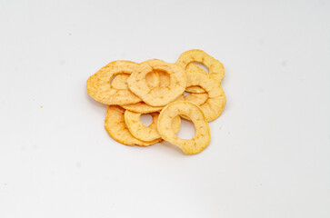 Apple chips. Useful dried fruits for a light snack. White background.