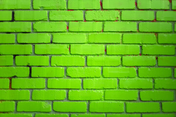 Green brick wall background with touch of red