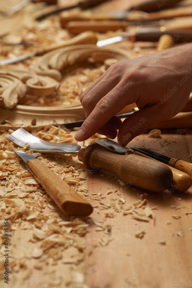 Wall mural carpenter wood carving equipment. woodworking, craftsmanship and handwork concept. wood processing. 