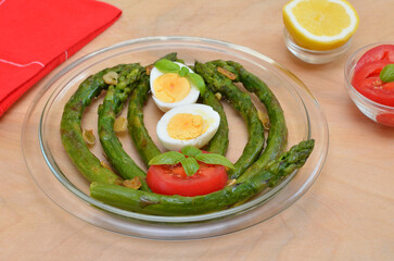 delicious and healthy lunch asparagus and eggs and vegetables