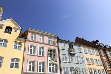 Fototapeta na wymiar Nyhavn district in Copenhagen, Denmark. City center panoramic view of colorful houses. High quality photo