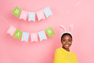 Portrait of charming positive person toothy smile look camera bunny ears headband isolated on pink color background