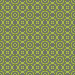 Seamless vector pattern with fresh grass green dots on grey background