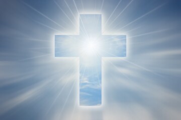 shining cross on blurred sky