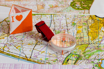 Sport orienteering. Symbols of sport topographic map, magnetic compass and prism with symbol I love