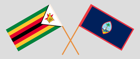 Crossed flags of Zimbabwe and Guam. Official colors. Correct proportion