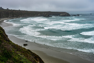 waves crashing on the beach in Big Sur Sanddollar beach
