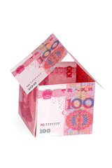 A house made of yuan isolated on a white background